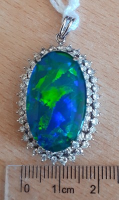 Lot 2010 - A Chinese Composite Opal and Diamond Pendant...