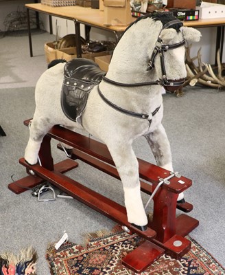 Lot 1089 - A Modern Rocking Horse, on stained tressel...