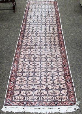 Lot 1013 - A Kashmir Silk Piled Runner, the ivory lattice...