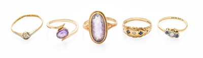 Lot 86 - Five Rings, including a 9 carat gold sapphire...