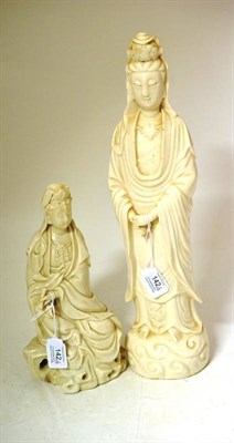 Lot 142 - A Chinese Blanc de Chine Figure of Guanyin, Qing Dynasty, the seated figure wearing flowing...