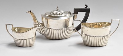 Lot 23 - A Three-Piece Victorian Silver Tea-Service, by...