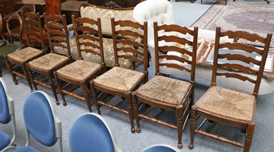 Lot 1250 - A Set of Six Oak Ladder Back Dining Chairs,...