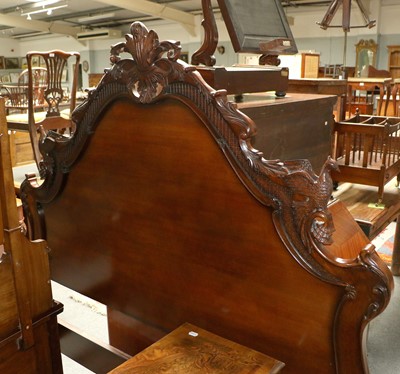 Lot 1228 - A 20th Century Carved Mahogany Double Bedstead,...