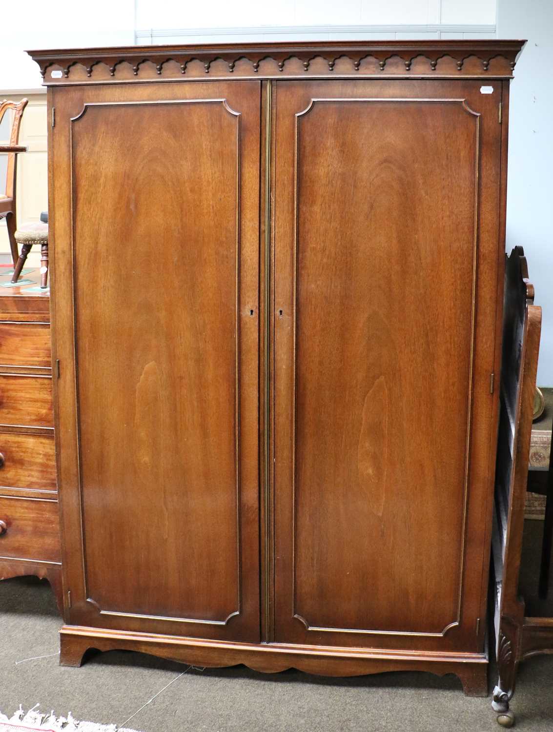 Lot 1272 - A Mahogany Double Wardrobe, with beaded...