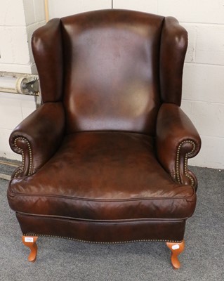 Lot 1142 - A Pair of Reproduction Wing-Back Armchairs,...