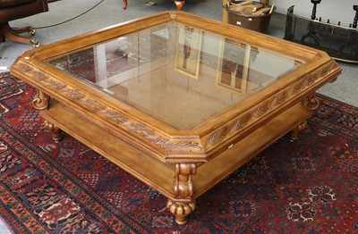 Lot 1163 - A Reproduction Hardwood Glass Top Coffee Table,...