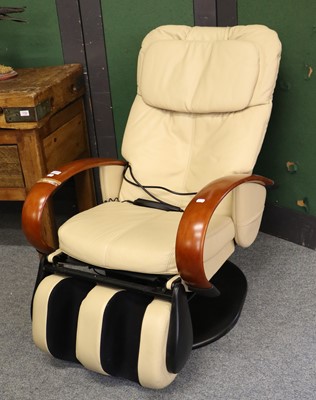 Lot 1141 - A Modern Beige Leather Electric Massage Chair,...