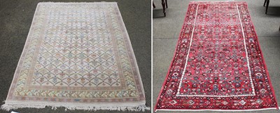 Lot 1012 - A Hussainabad Rug, the strawberry Herati field...