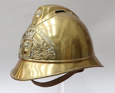 Lot 159 - A French Brass Adrian Fire Helmet, with raised...