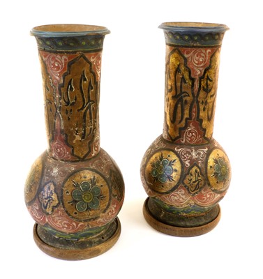 Lot 113 - A Pair of Persian Painted and Gilt Terracotta...
