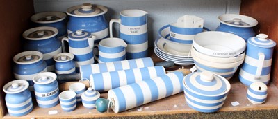 Lot 246 - A collection of Cornish ware including jars...