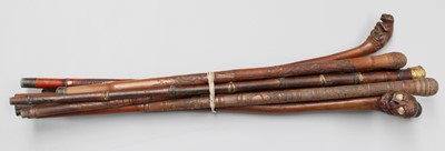 Lot 254 - A Collection of Oriental Bamboo Walking Canes,...