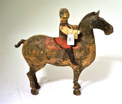 Lot 151 - A Chinese Pottery Equestrian Group, in Tang style, the rider with black jacket and red breeches, on
