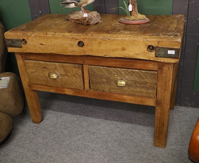 Lot 1139 - A Butchers Block, the base fitted with two...