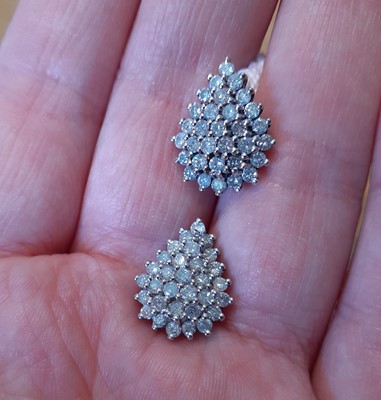 Lot 2057 - A Pair of Diamond Cluster Earrings the pear...
