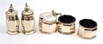 Lot 21 - A George V silver five piece cruet set, comprising pair of salts, two pepperettes and a mustard...