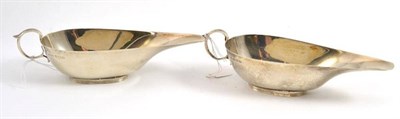 Lot 23 - A pair of George V silver sauce boats, Birmingham 1932