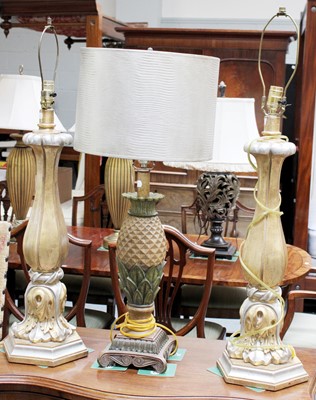 Lot 1313 - A Pair of Giltwood Table Lamps, with acanthus...