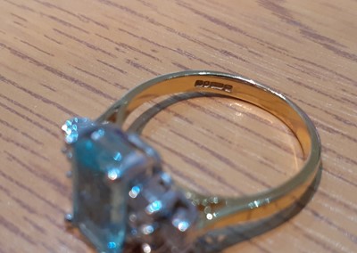 Lot 2029 - An 18 Carat Gold Aquamarine and Diamond Ring...