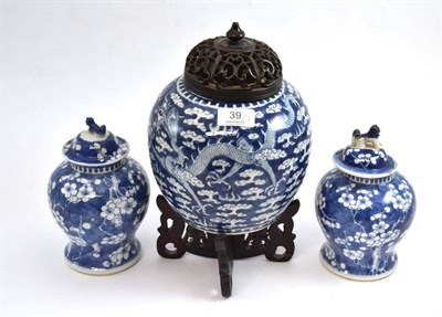Lot 39 - Chinese blue and white jar (wood cover and stand) and a pair of small Chinese blue and white...