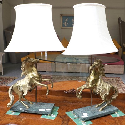 Lot 1173 - A Pair of Gilt Metal Marley Horse Table...