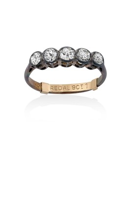 Lot 2075 - A Diamond Five Stone Ring the graduated old...