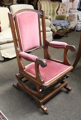 Lot 1337 - A Carved Walnut American Rocking Chair, early...