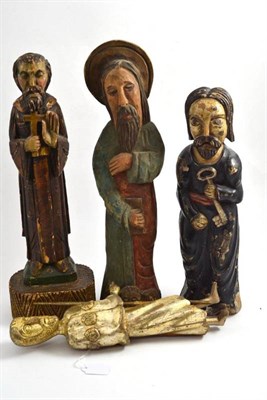 Lot 50 - Four carved religious figures