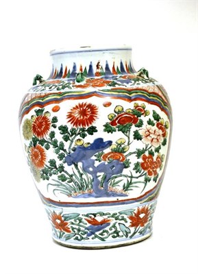 Lot 156 - A Chinese Wucai Porcelain Jar, mid 17th century, with loop handles painted with foliage amongst...