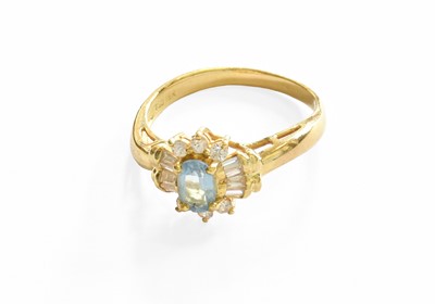 Lot 29 - An Aquamarine and Diamond Cluster Ring,...