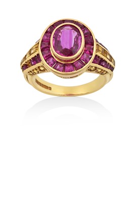 Lot 2202 - An 18 Carat Gold Ruby and Yellow Sapphire...