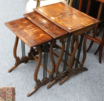 Lot 1170 - A Nest of Oyster Veneered Reproduction Tables,...