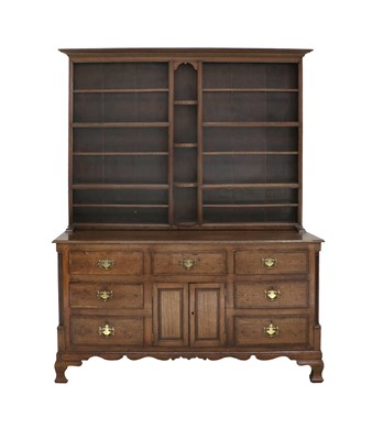 Lot 696 - A George III Oak and Mahogany Enclosed Dresser...