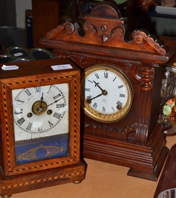 Lot 73 - An inlaid alarm timepiece, a striking mantel clock