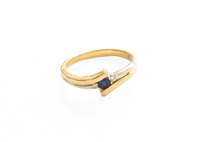 Lot 47 - An 18 Carat Two Colour Gold Sapphire and...