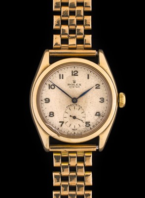 Lot 2136 - Rolex: A 9 Carat Gold Wristwatch, signed Rolex,...