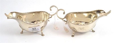 Lot 92 - A pair of George V silver sauce boats, Sheffield 1929, together with a pair of silver rat tail...