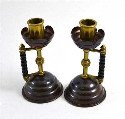 Lot 103 - Pair of Aesthetic movement candlesticks