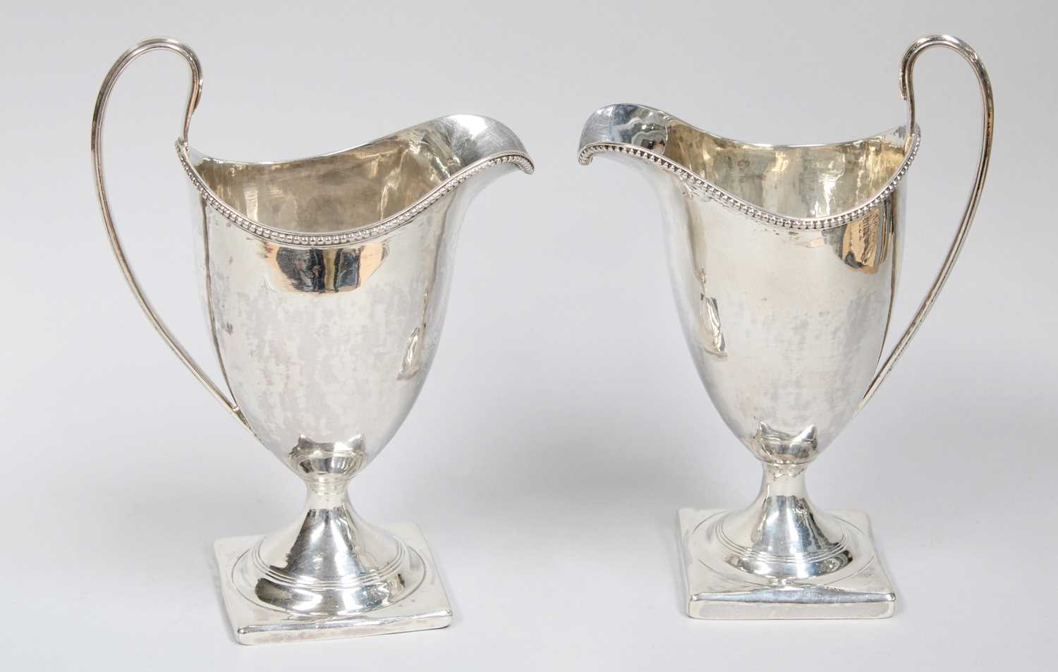 Lot 70 - Two George III Silver Cream-Jugs, by Peter and...
