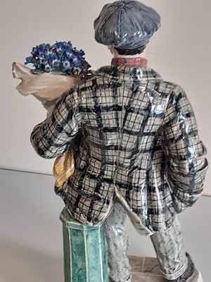 Lot 223 - A Chelsea Pottery Group "The Cineraria Boy",...