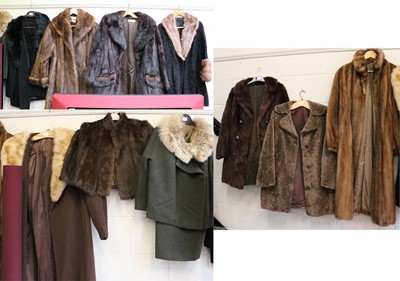 Lot 1069 - A Collection of Fur and Faux Fur Coats,...