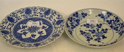 Lot 164 - A Chinese Porcelain Saucer Dish, 18th century, painted in underglaze blue with fruiting finger...