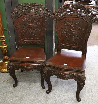 Lot 1096 - A pair of early 20th century Oriental carved...