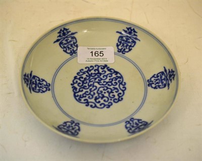 Lot 165 - A Chinese Porcelain Saucer Dish, Qianlong reign mark, painted in underglaze blue with a roundel...