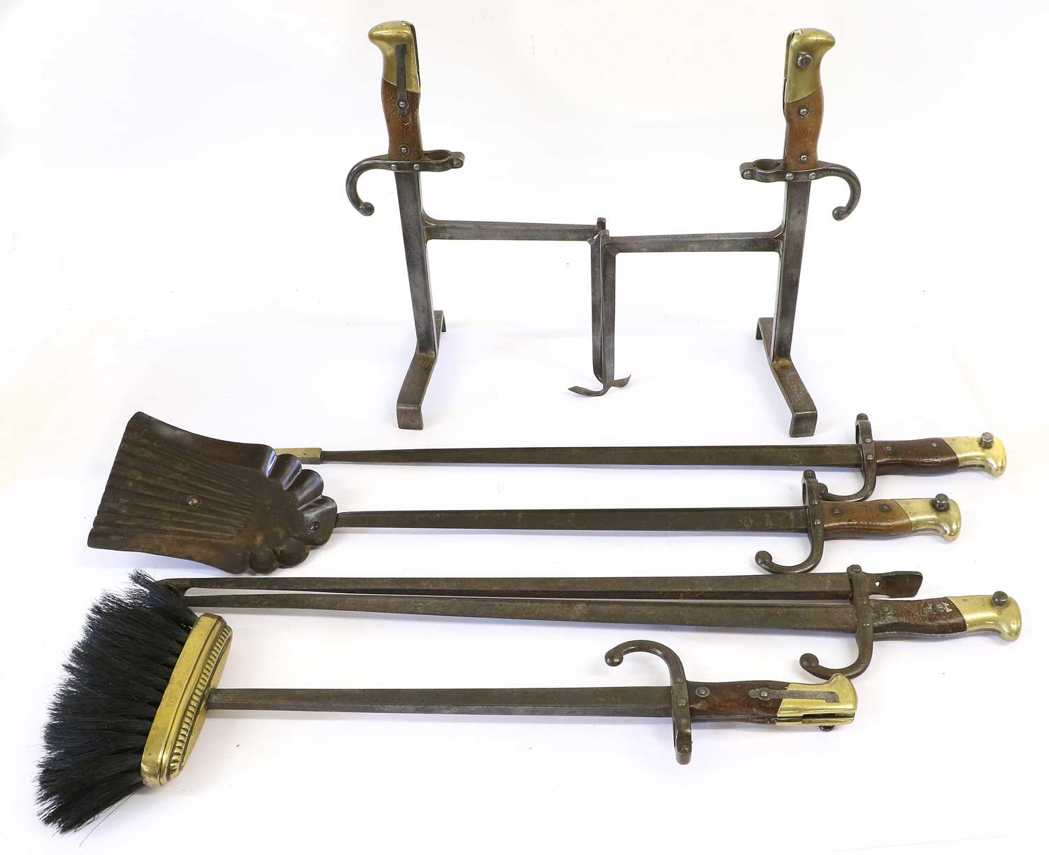 Lot 77 - A Fire Companion Set, each piece made from a...