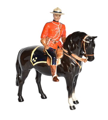 Lot 101 - Beswick Canadian Mountie, model No. 1375,...