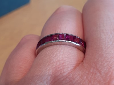 Lot 2070 - A Ruby Eternity Ring the calibré cut rubies in...