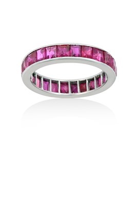 Lot 2070 - A Ruby Eternity Ring the calibré cut rubies in...