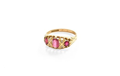 Lot 55 - An 18 Carat Gold Synthetic Ruby and Diamond...